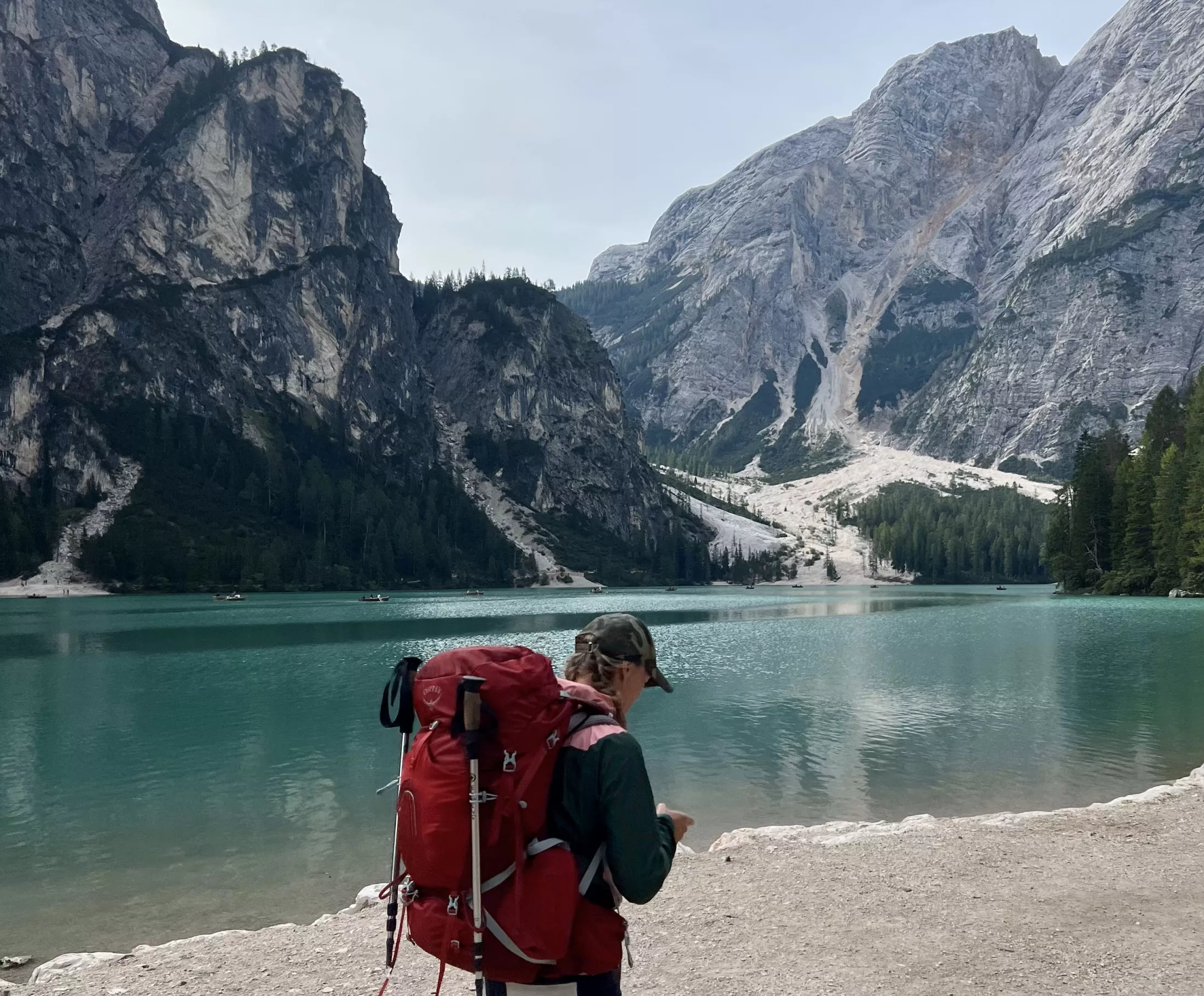Person by lake in mountains