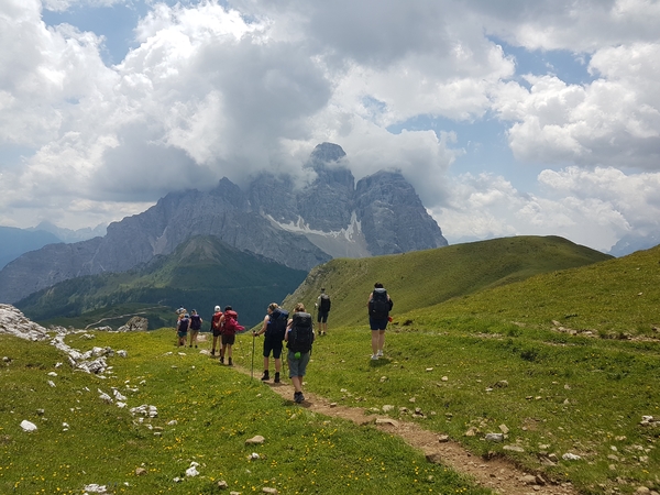 People on a trail in mountains