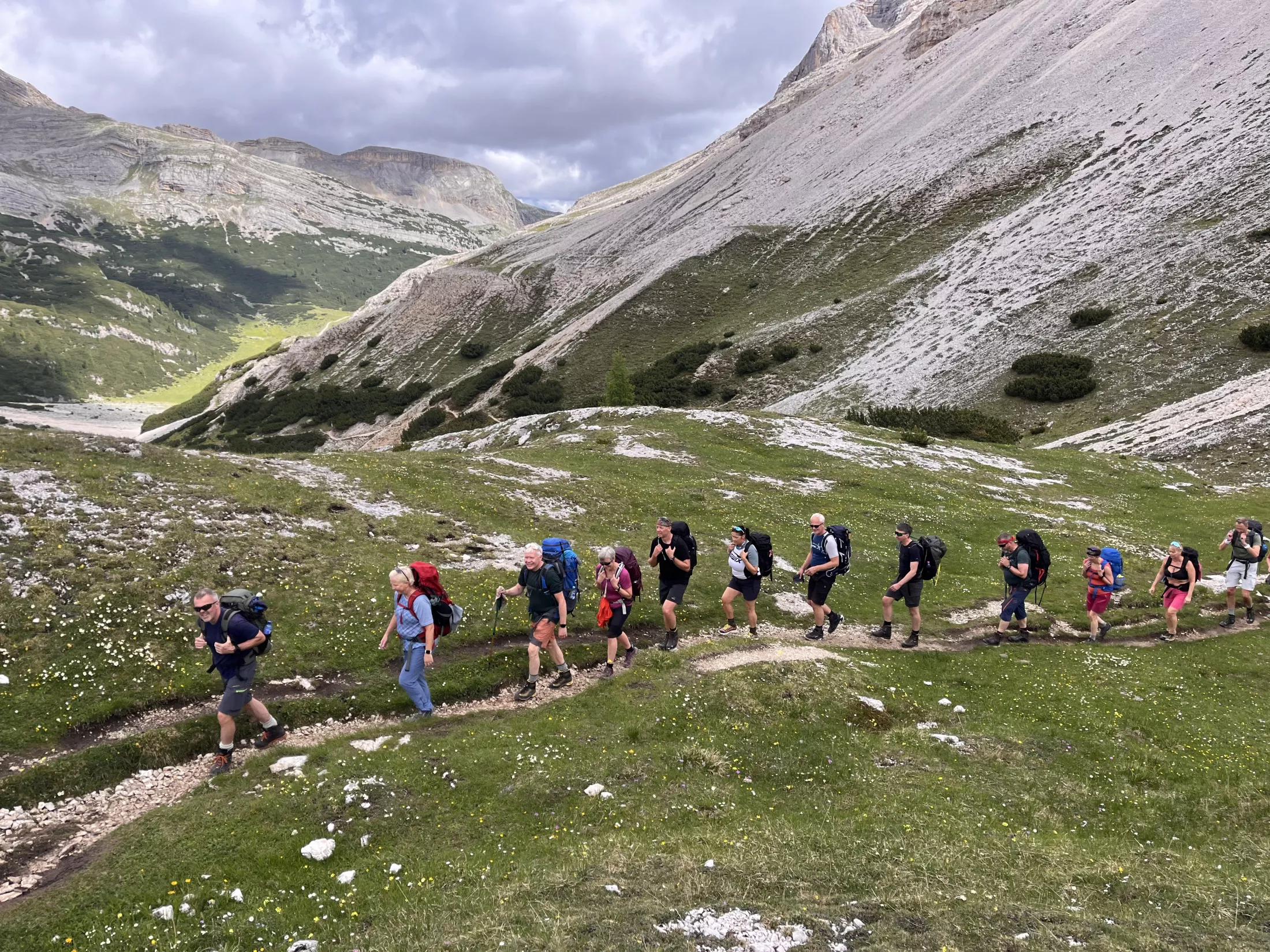 People on trail in mountain