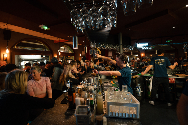 People enjoying après-ski at MOO Bar.