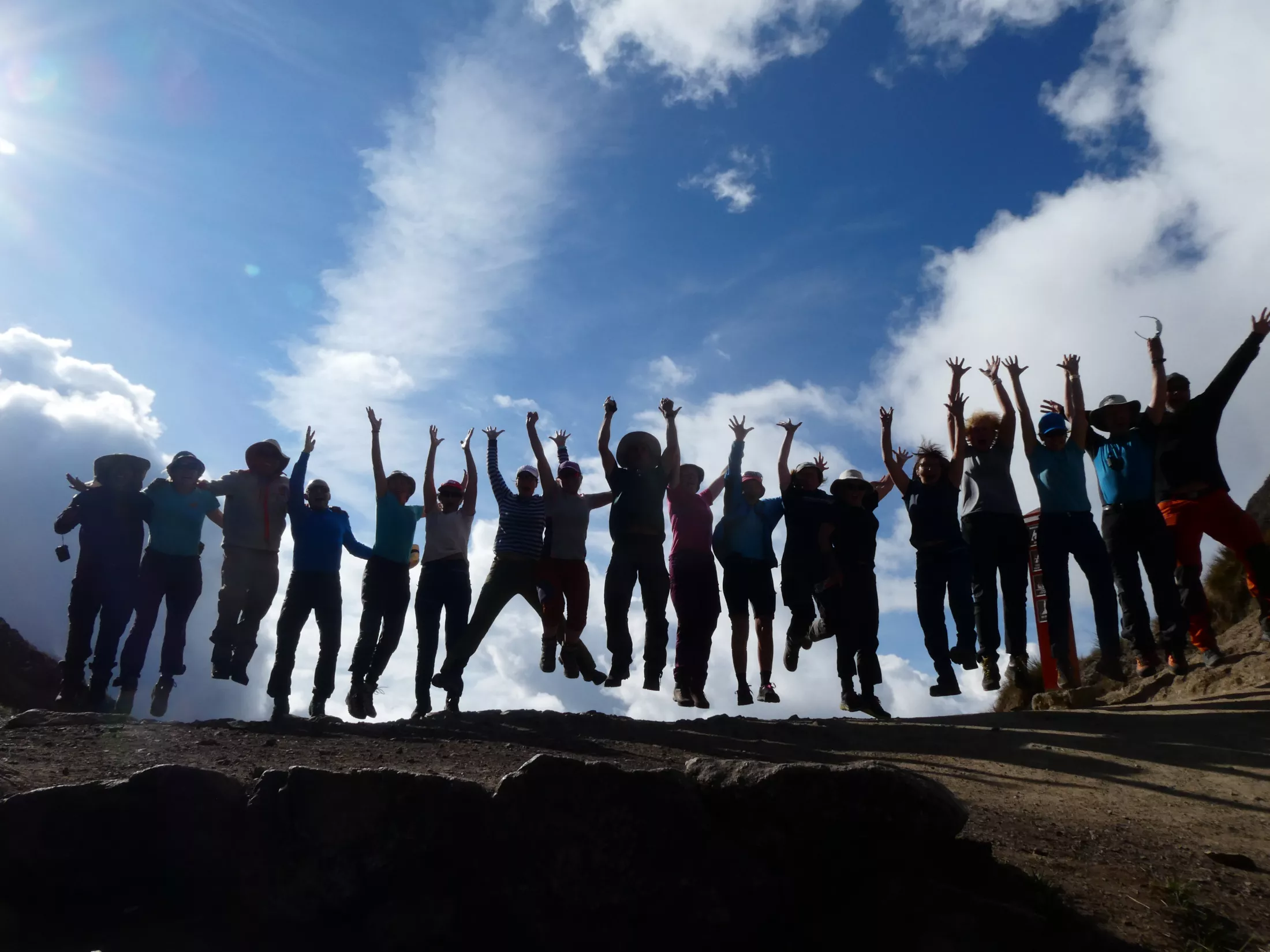 People jumping to pose for photo