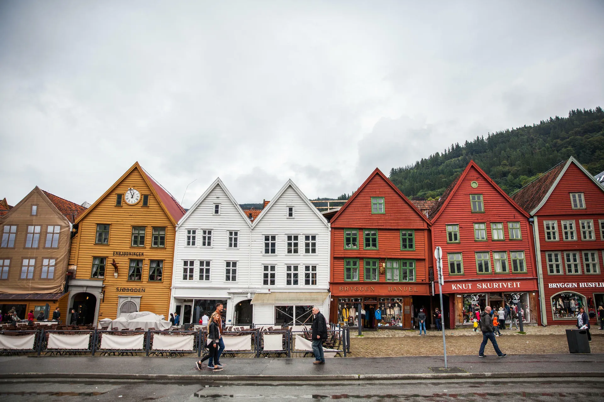The colorful houses at Bryggen in Bergen with a grey sky.
