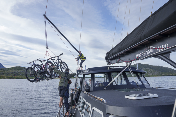 Bikes being loaded onto a boat
