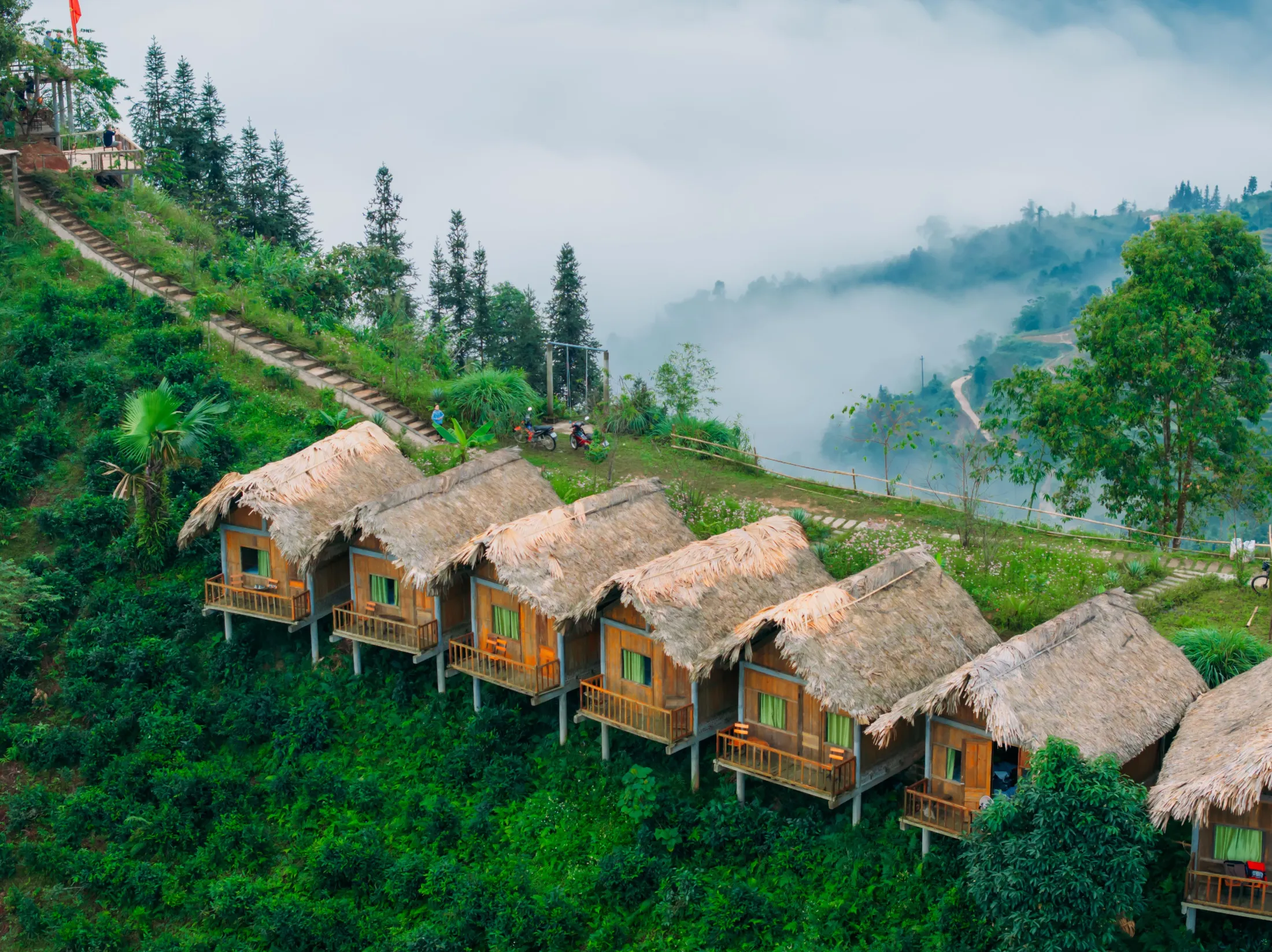 Traditional houses on a mountain ridge in Vietnam.