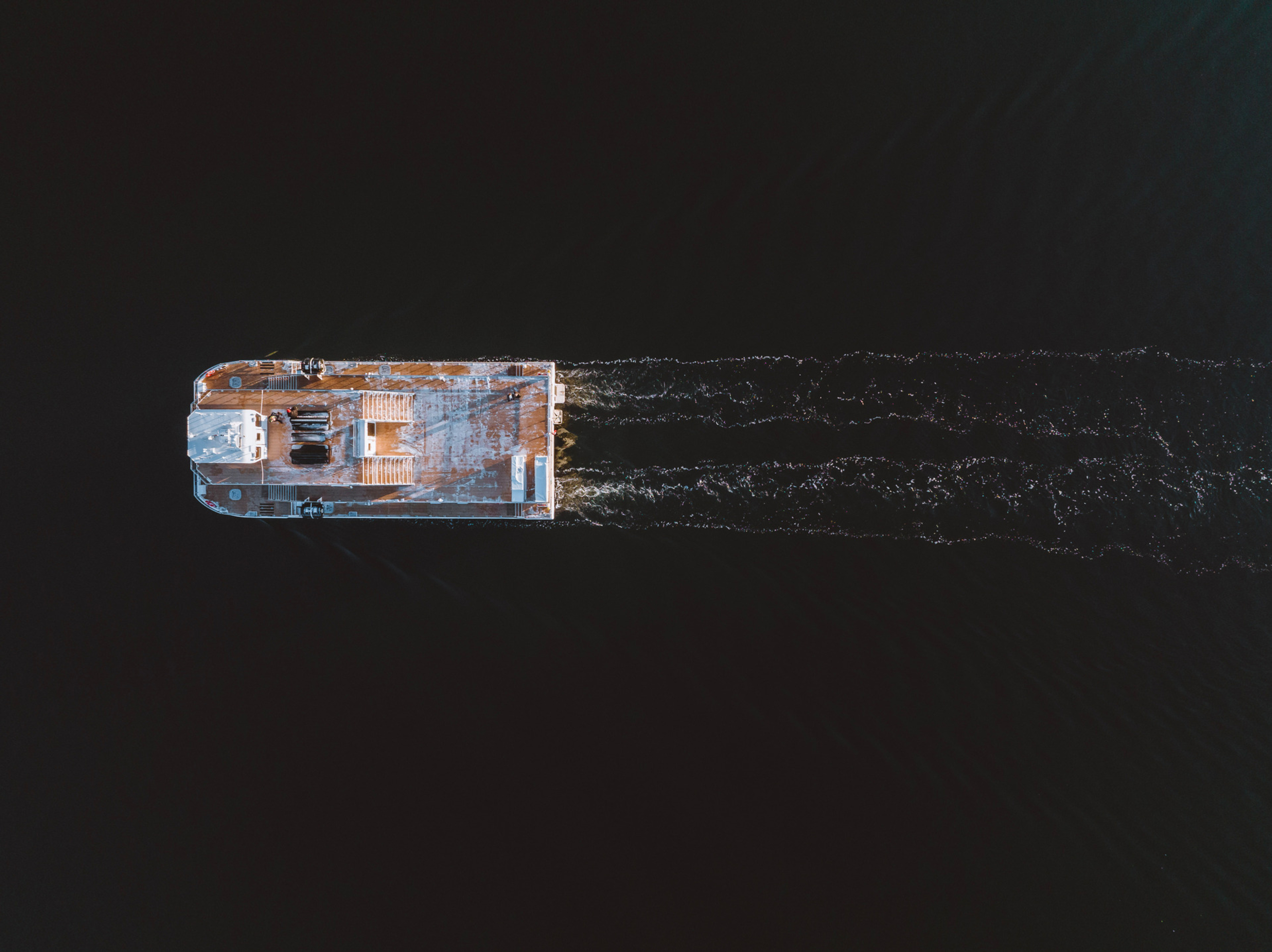 Aerial view of a boat in the ocean