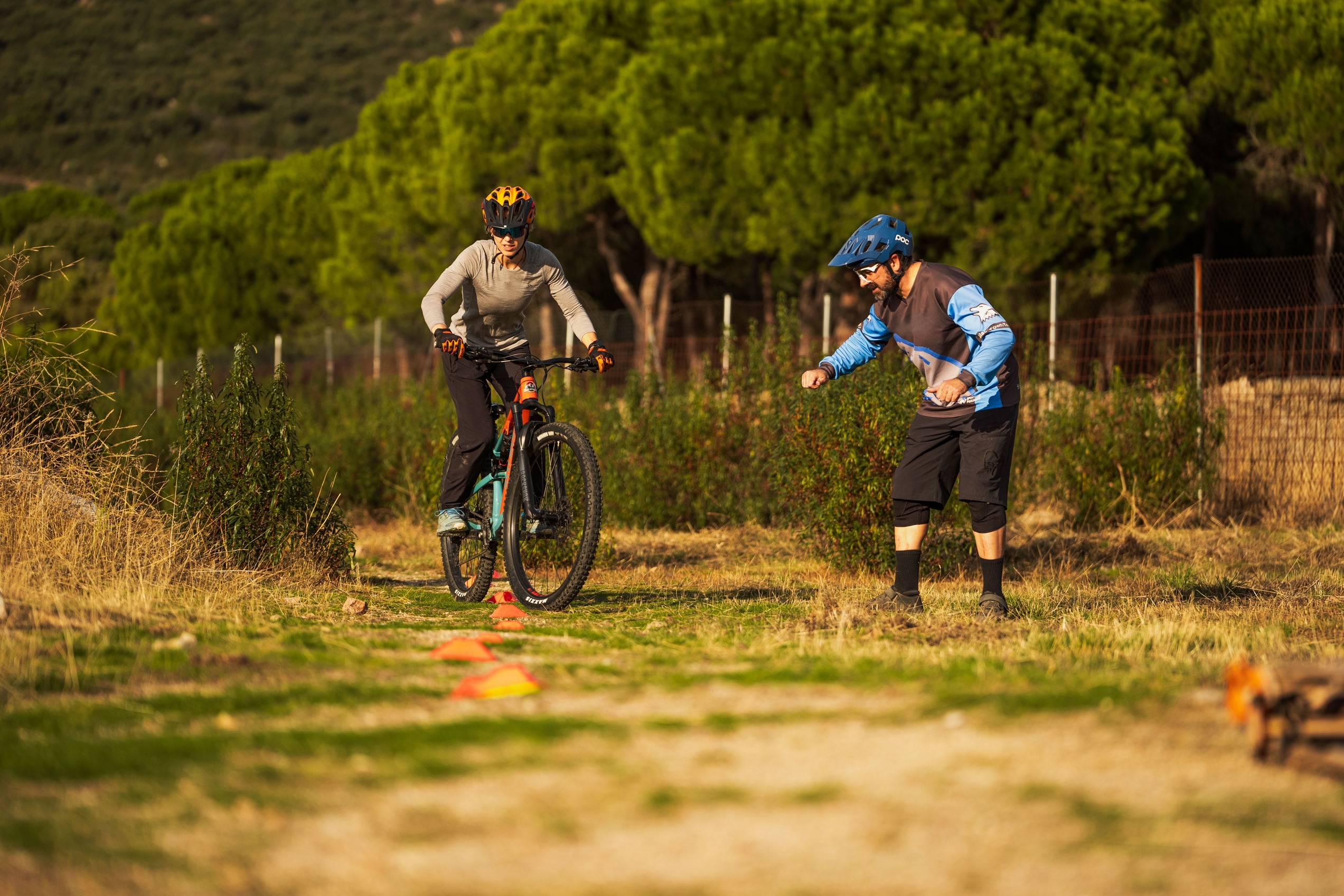 Mountain biker running obstacle course