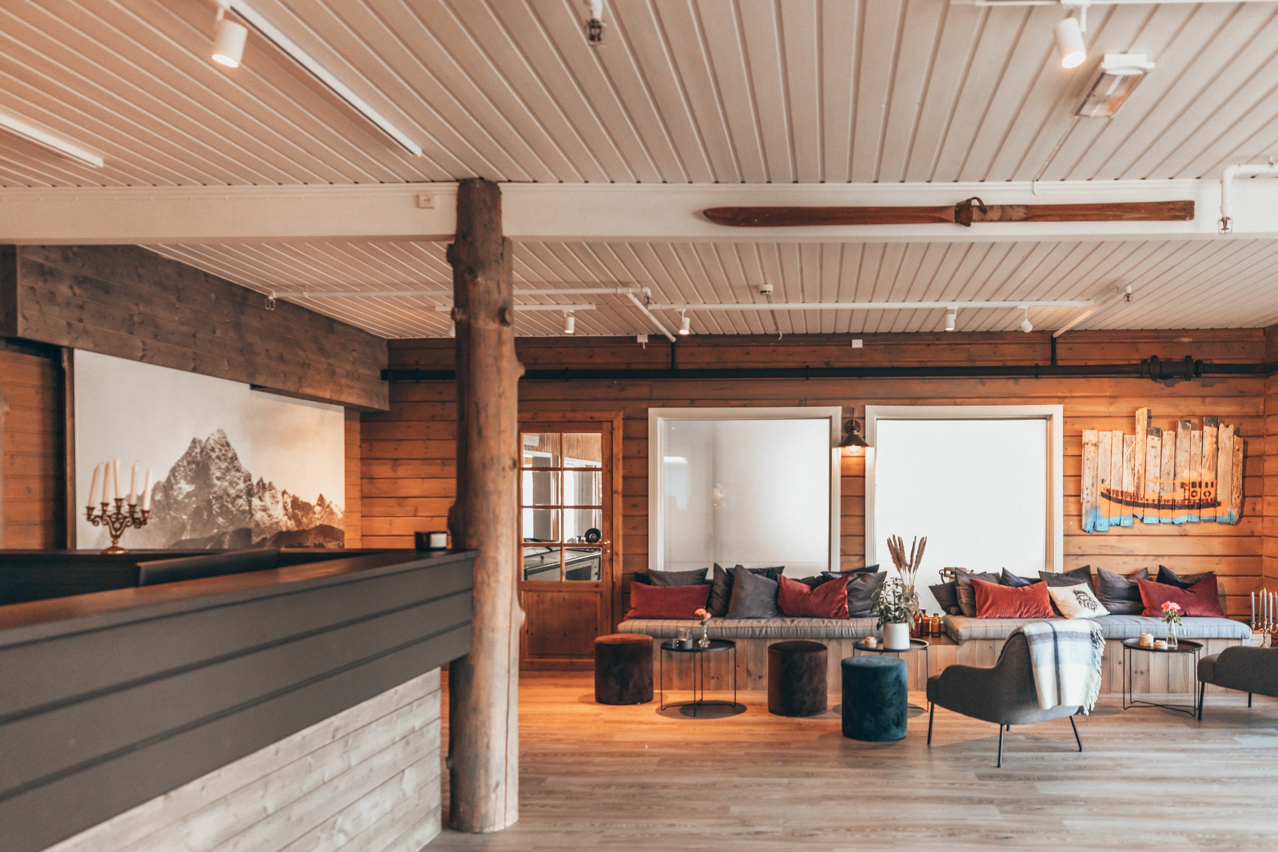 Cozy, wooden interior of a hotel lobby