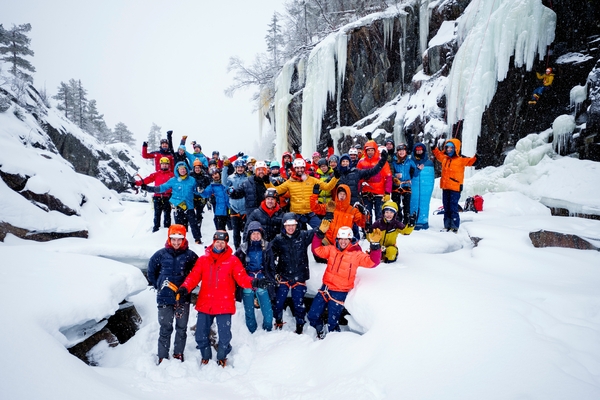 People standing in a snowy valley