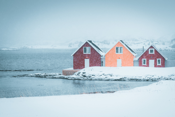 Houuses by the ocean in the snow