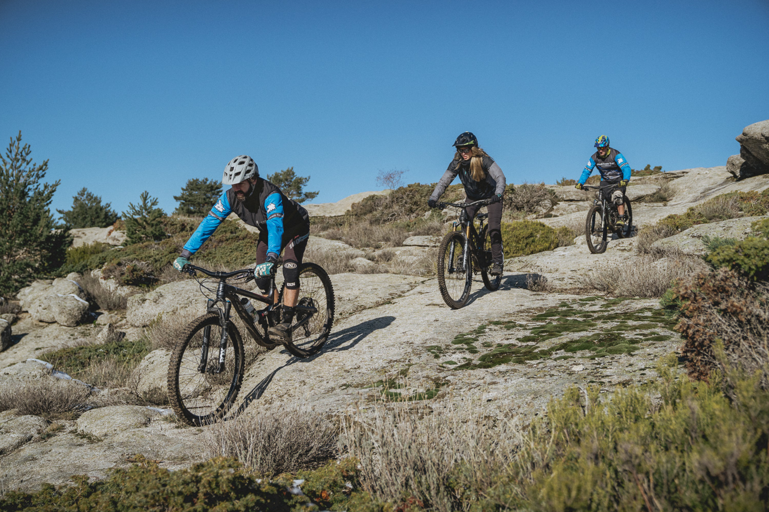 Mountain bikers riding on slick rock trail
