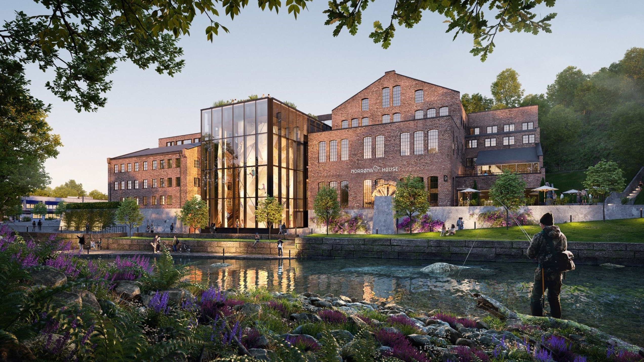 A house behind a river and a man fishing