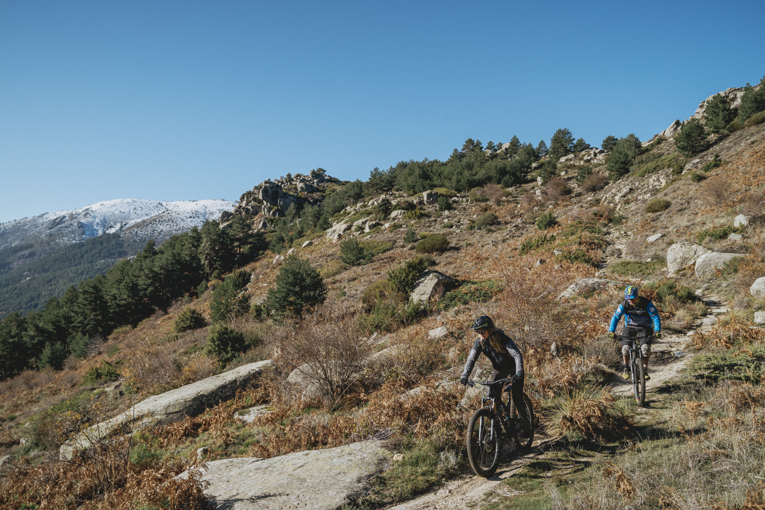 Mountain bikers riding down hill
