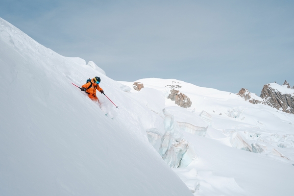 A skier in powder snow